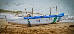 image of canoe on the beach